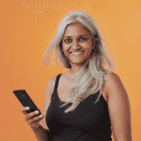 An image with an orange background and a woman holding a phone